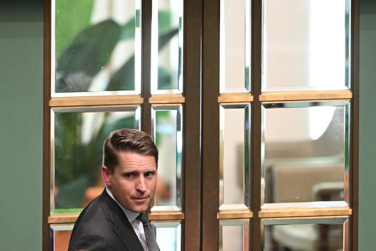 Andrew Hastie leaves during Question Time at Parliament House.