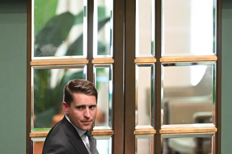 Andrew Hastie leaves during Question Time at Parliament House.