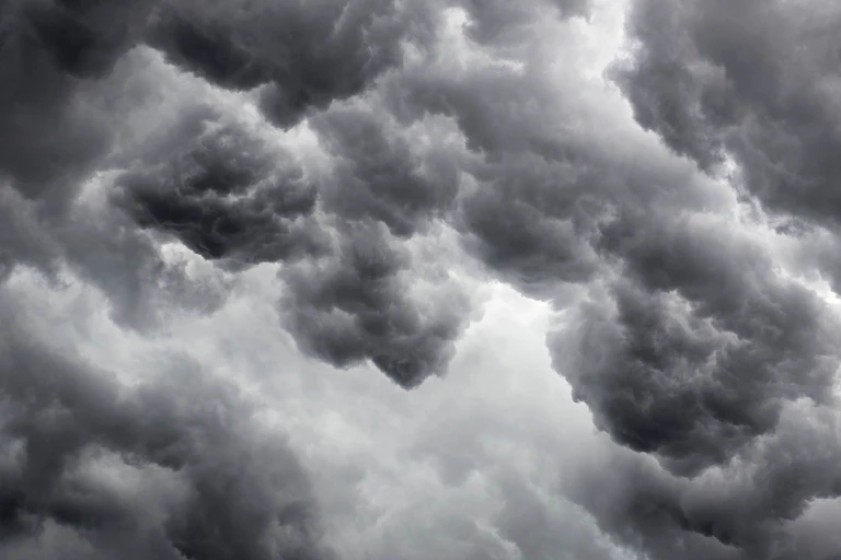 dark clouds seen from below.
