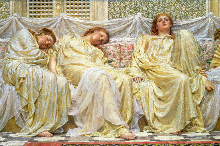 Women asleep on a sofa