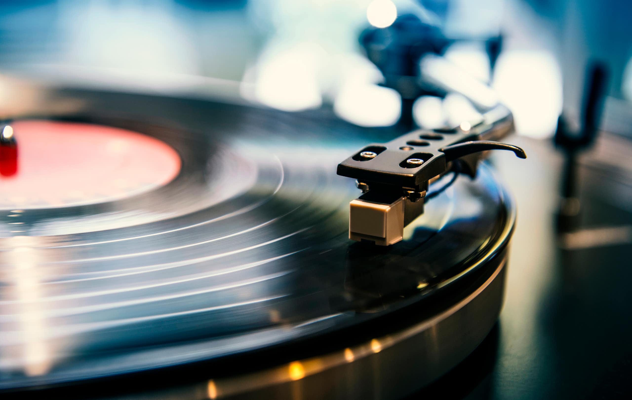 A vinyl record on a turntable.