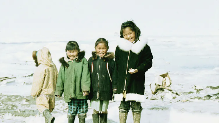 Four Inuit children.