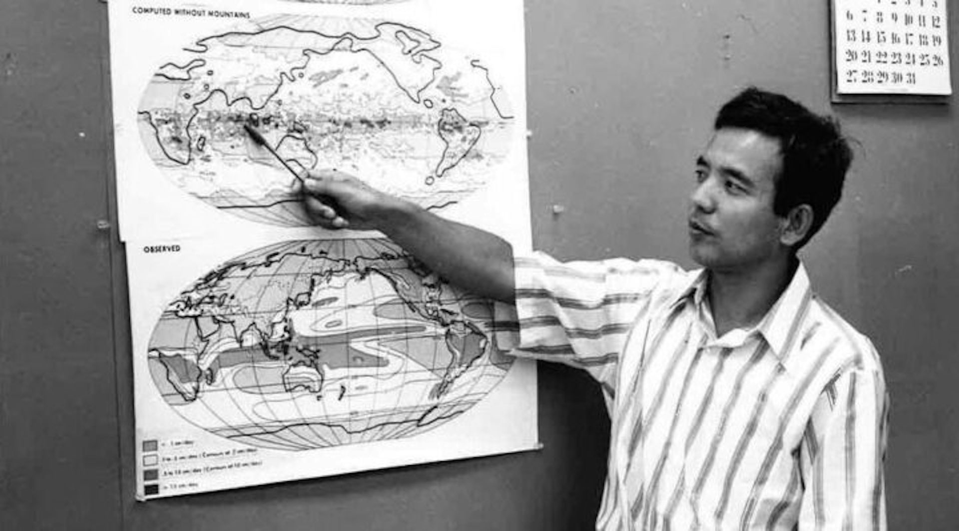 Syukuro Manabe pointing to a chart.
