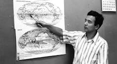 Syukuro Manabe pointing to a chart.