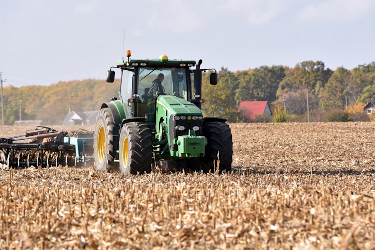 A tractor in a field near Kyiv. Ukraine.