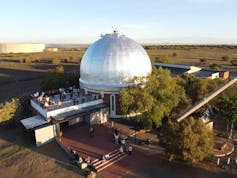 A building with a giant silver dome