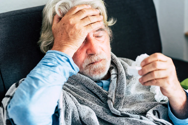 An elderly man with the flu.