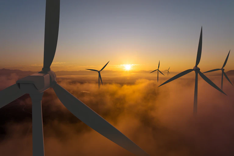 Wind turbines at sunset
