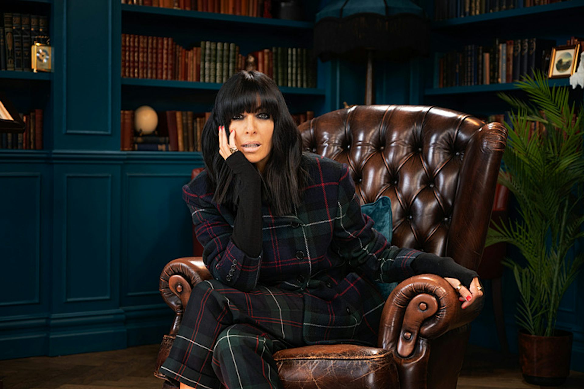 Claudia Winkleman in a library 