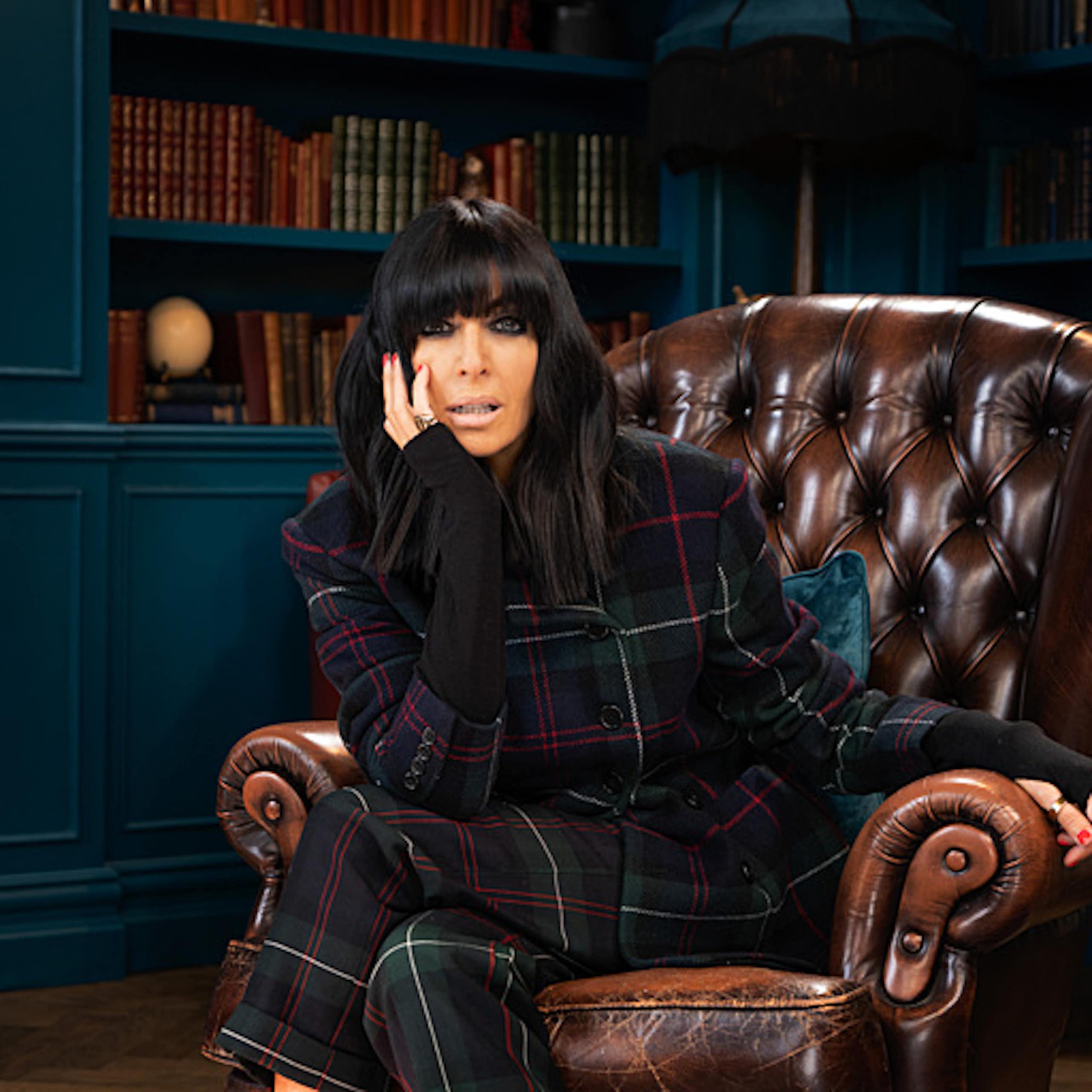 Claudia Winkleman in a library