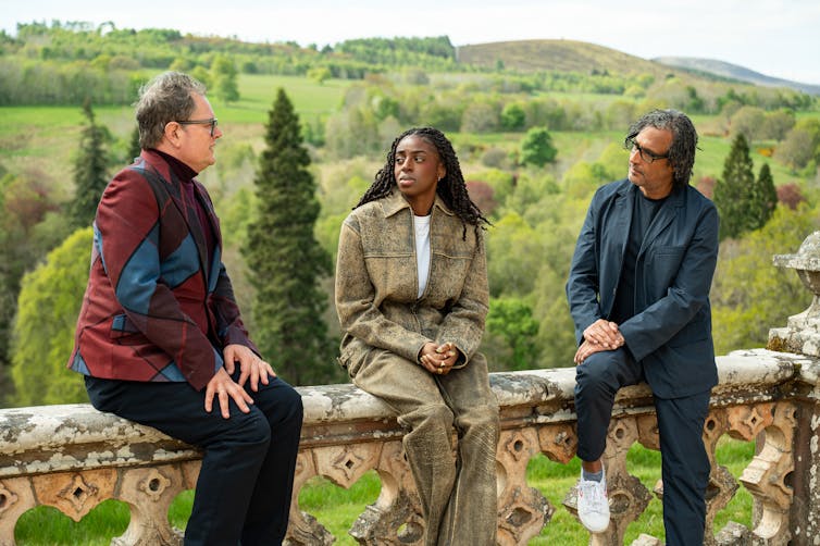 Alan Carr, Cat Burns and David Olusoga sat outside