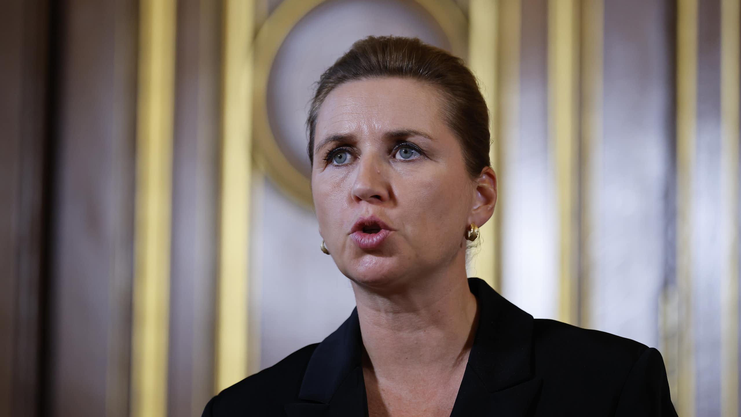Mette Frederiksen speaking at an event