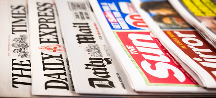 close up of titles of some popular UK newspapers