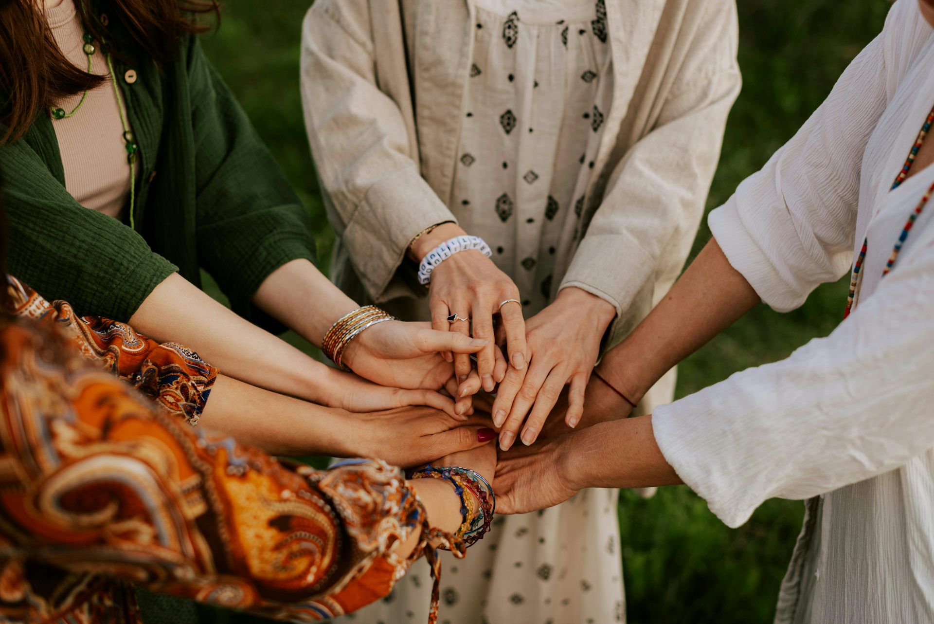A group of people holding hands