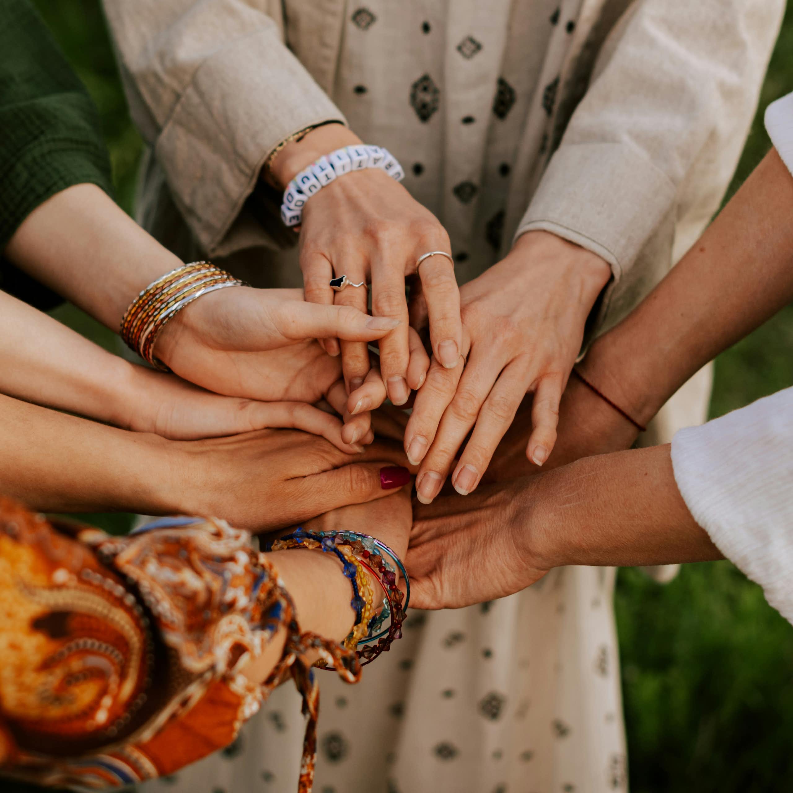 A group of people holding hands