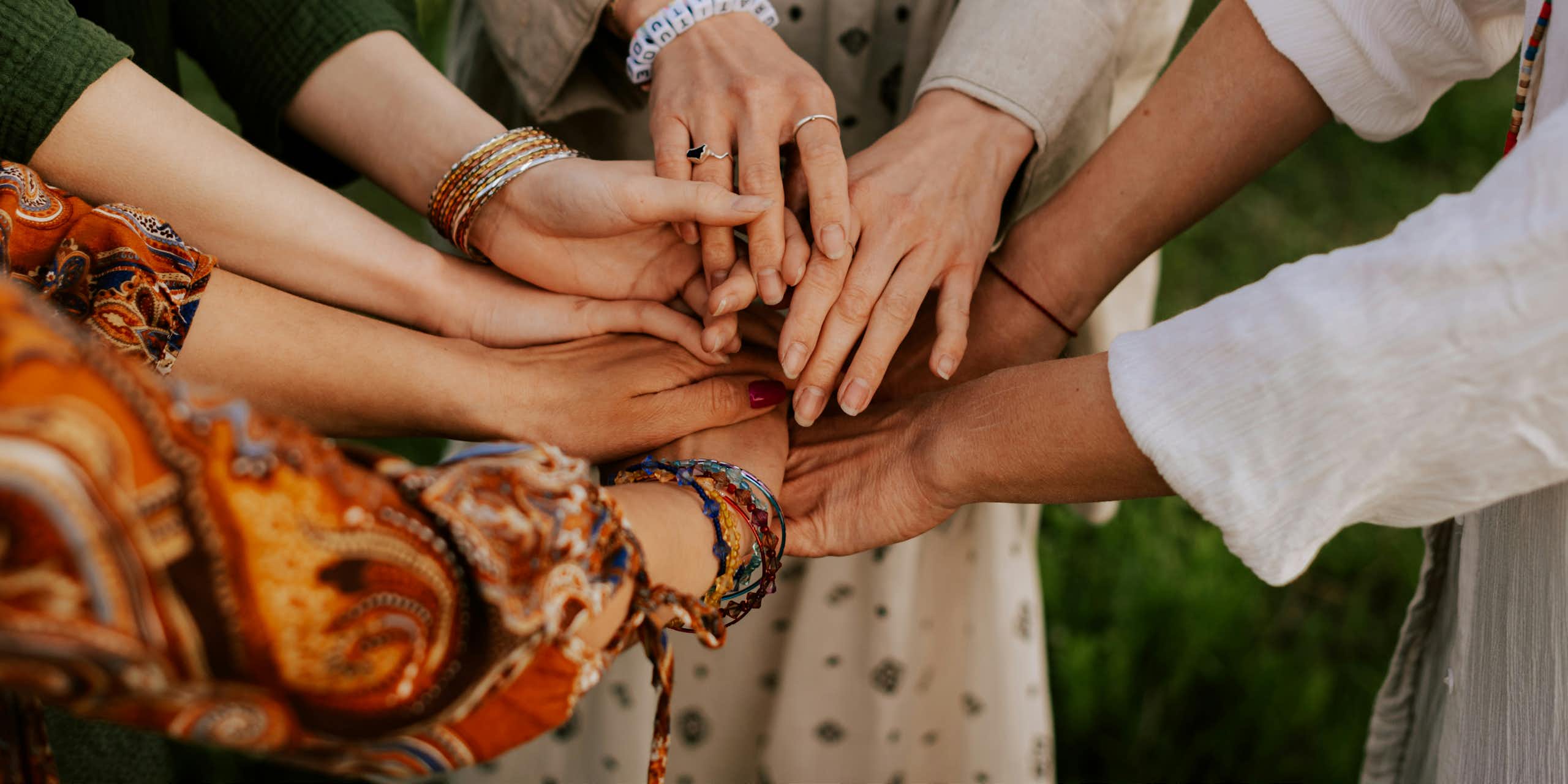 A group of people holding hands