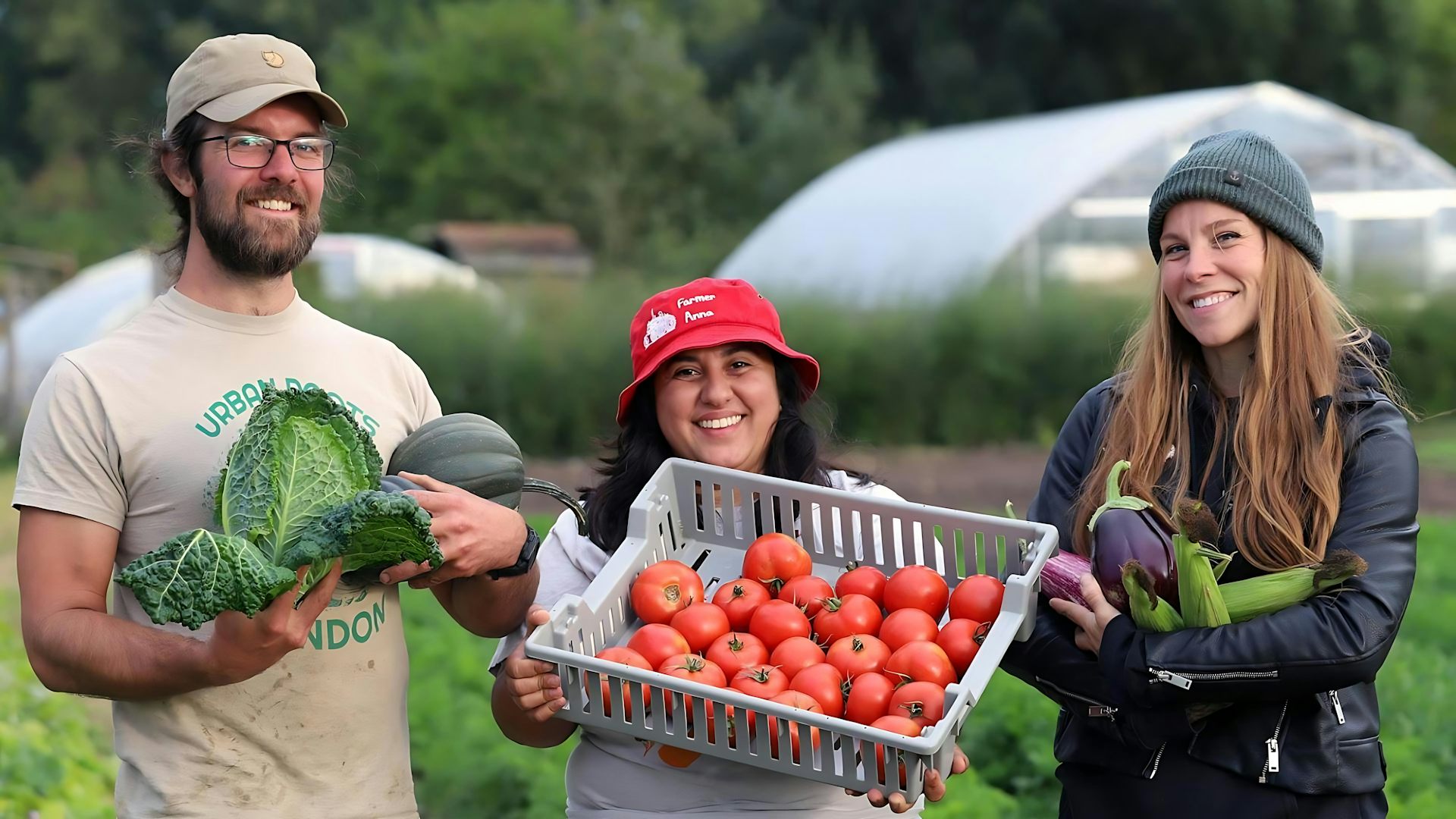 Urban farmers showing harvest. 