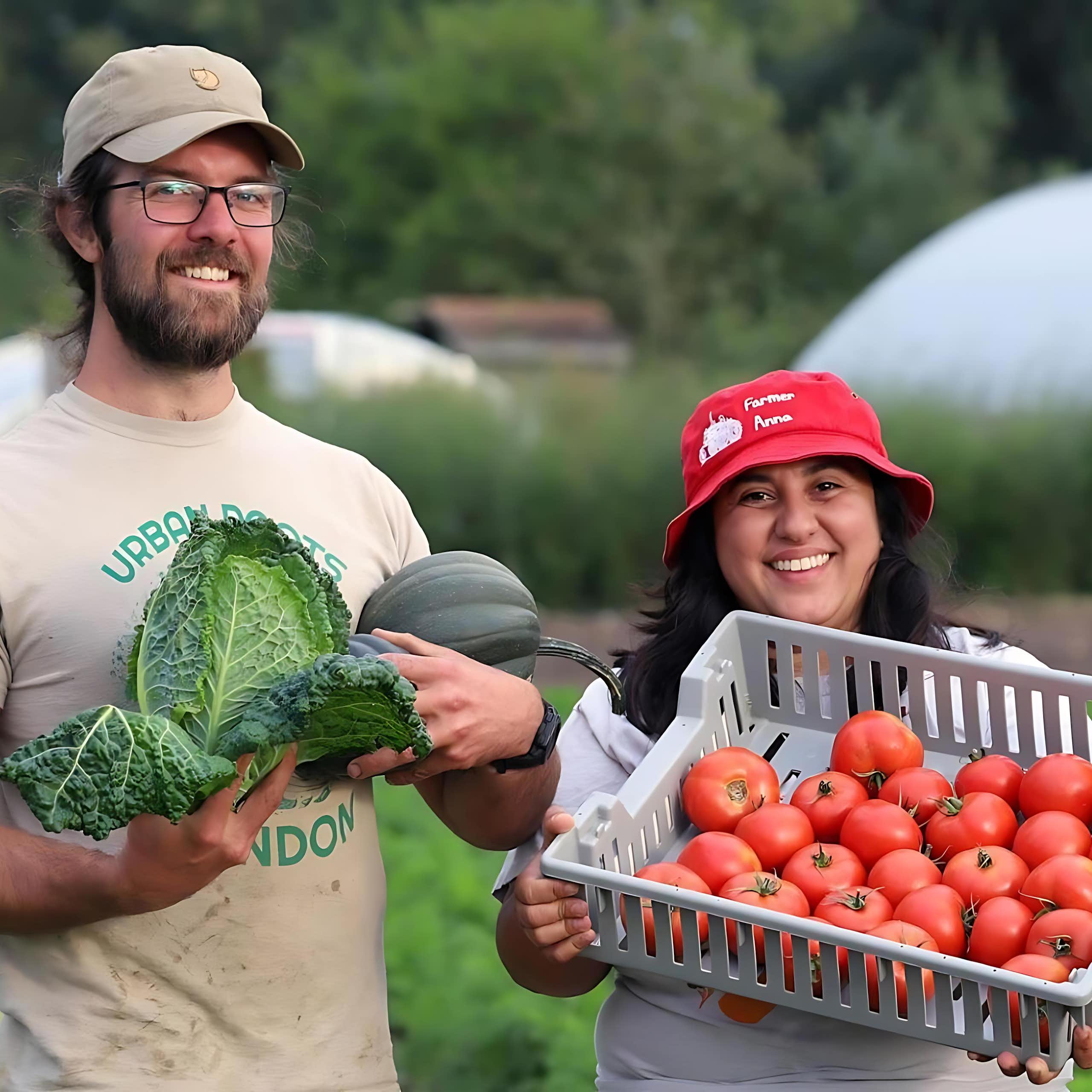 Urban farmers showing harvest.
