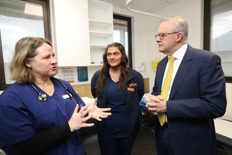 Prime Minister Anthony Albanese talks to clinical hospital staff