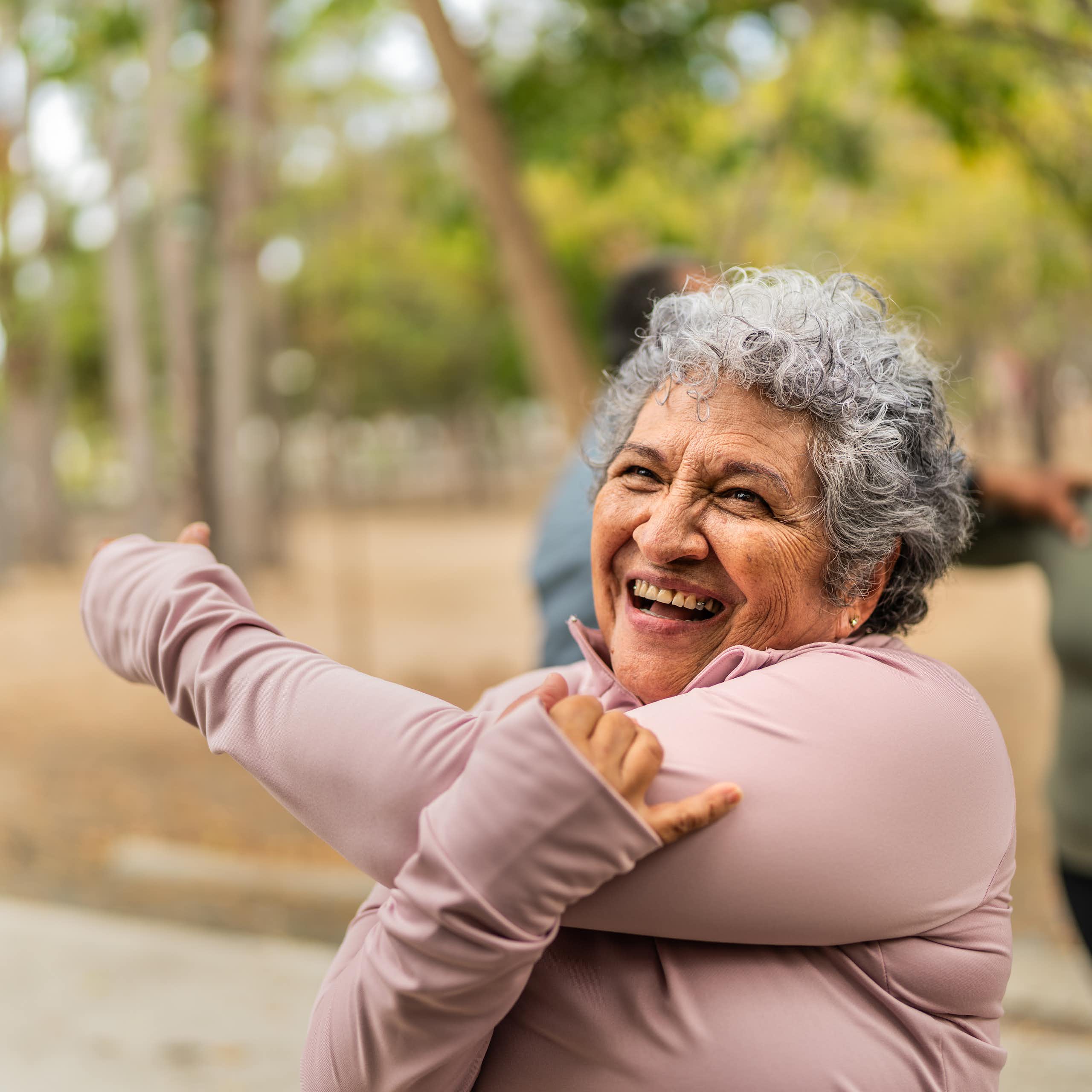 An older person doing stretching exercises