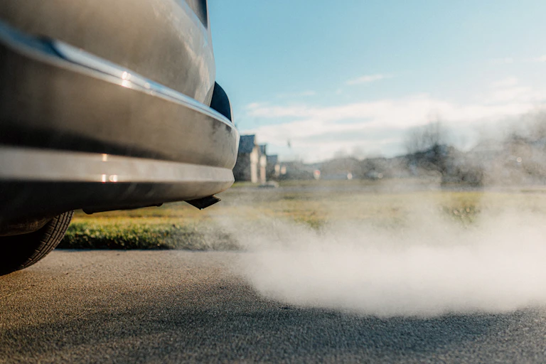 car tailpipe putting out smoke.