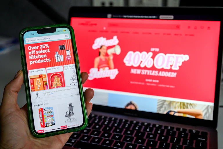 Black Friday sales promo on phone and laptop