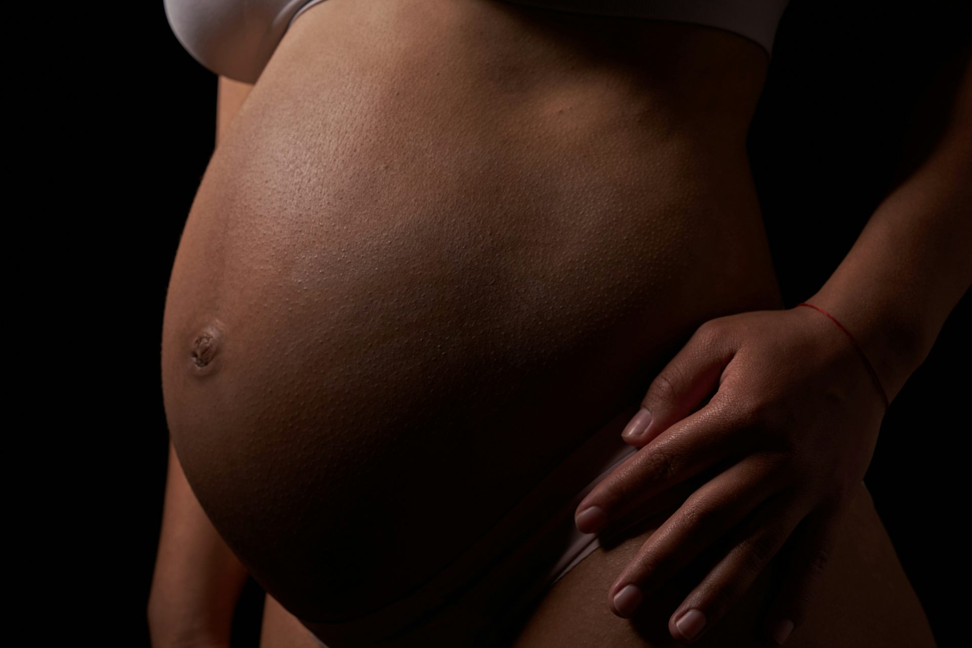 Woman's pregnant belly