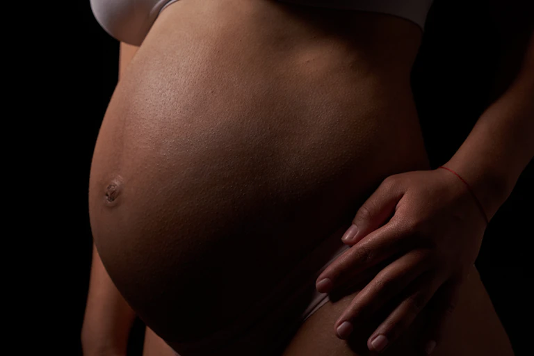Woman's pregnant belly