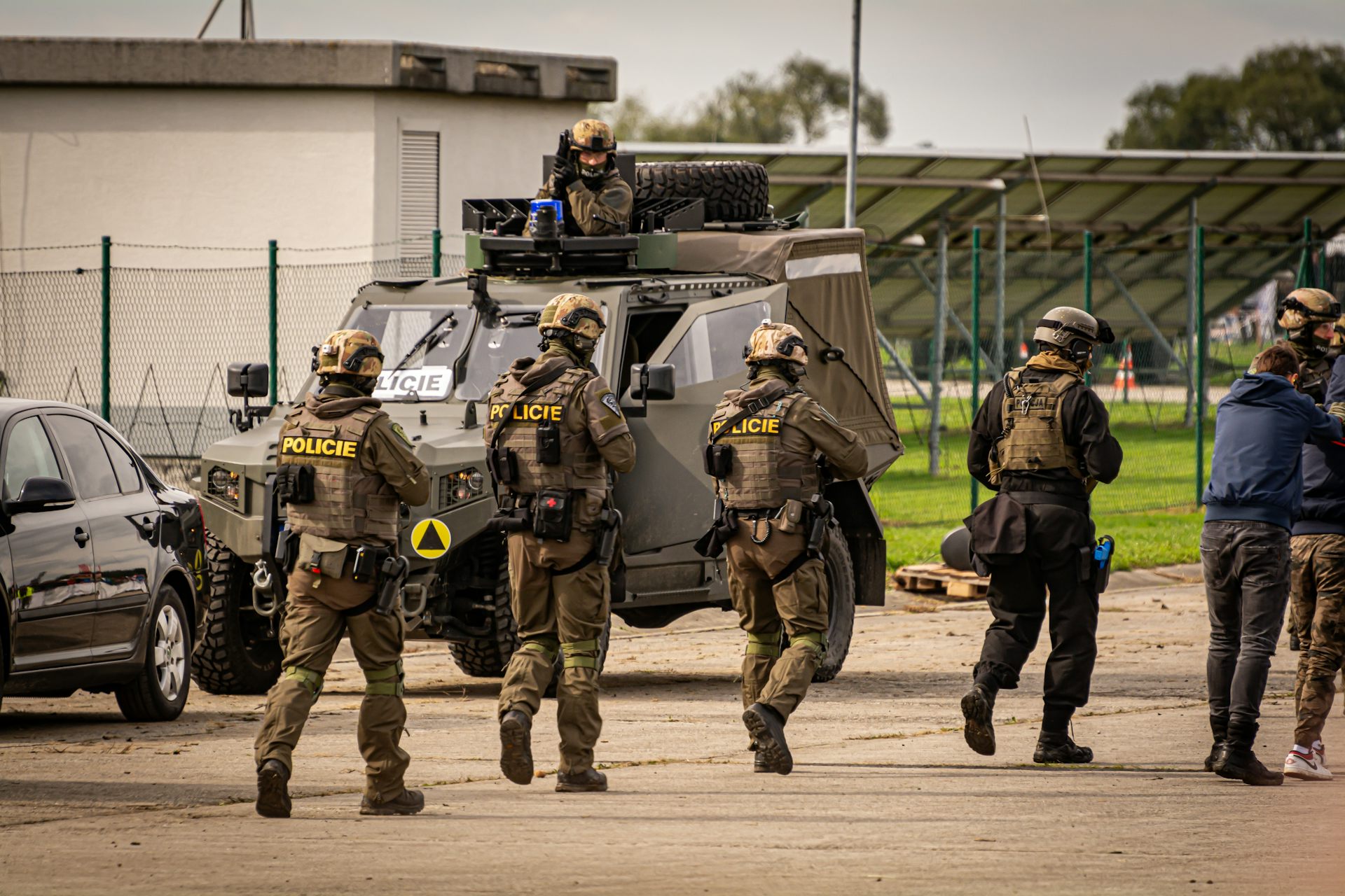 Team with army and police special forces rescue hostages in NATO wargames training.