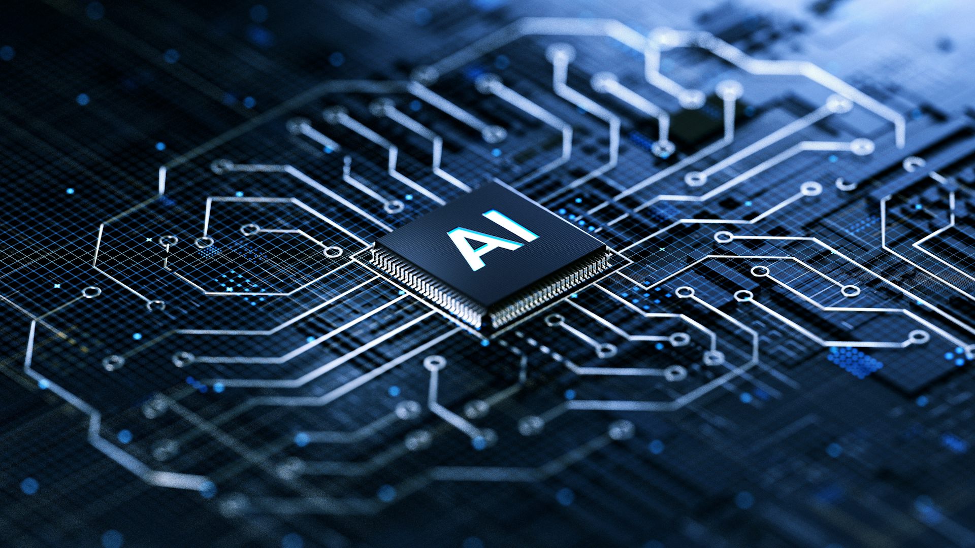 Computer chip marked 'AI' on circuit board.