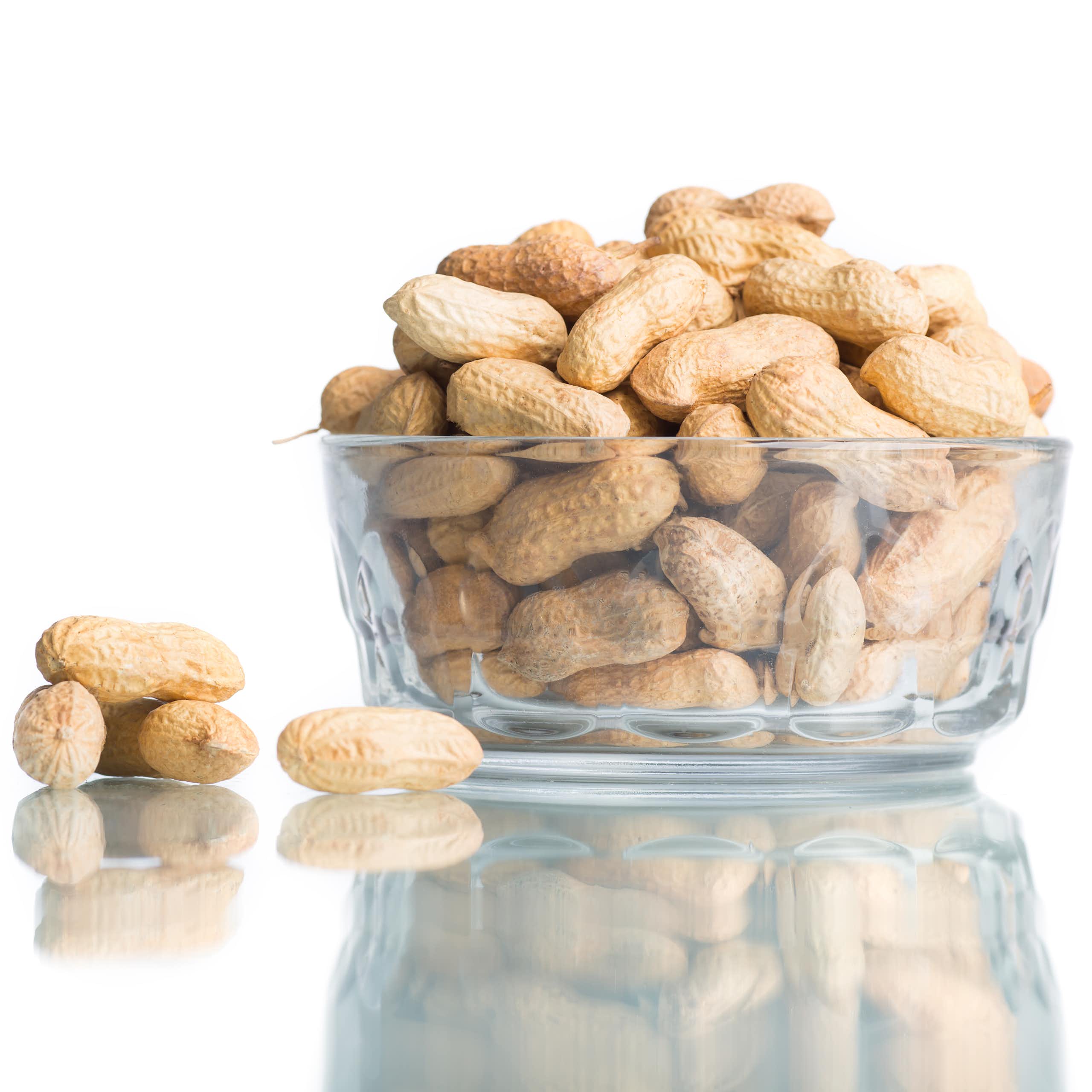 A bowl of whole peanuts.