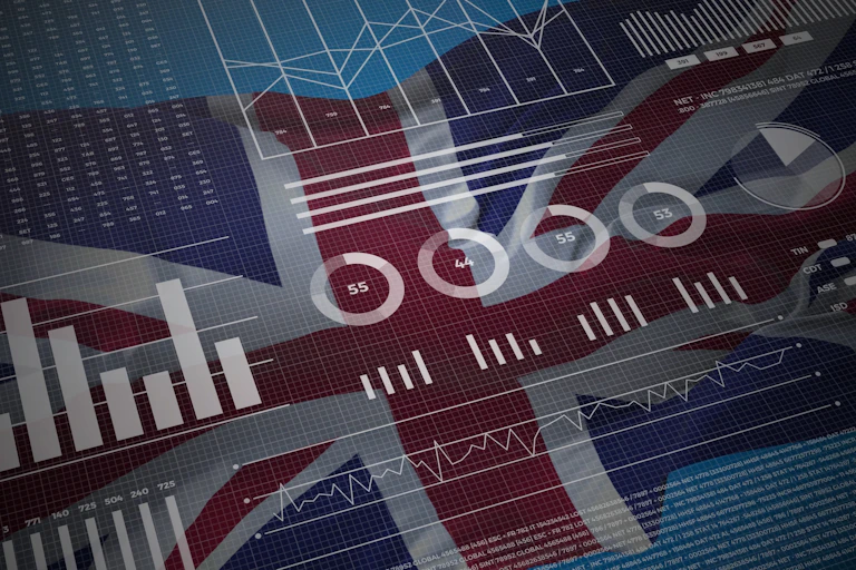 Charts and graphics over UK flag backdrop.