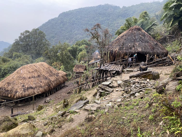 A scenic view of mountains with huts