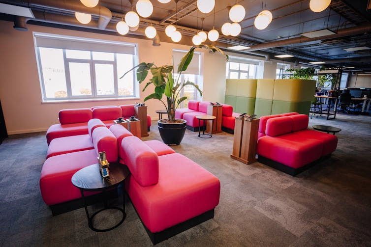 modern office space with breakout room with sofas