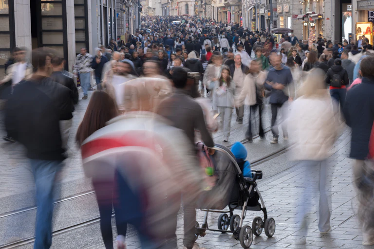 a crowded pedestrian street in a city