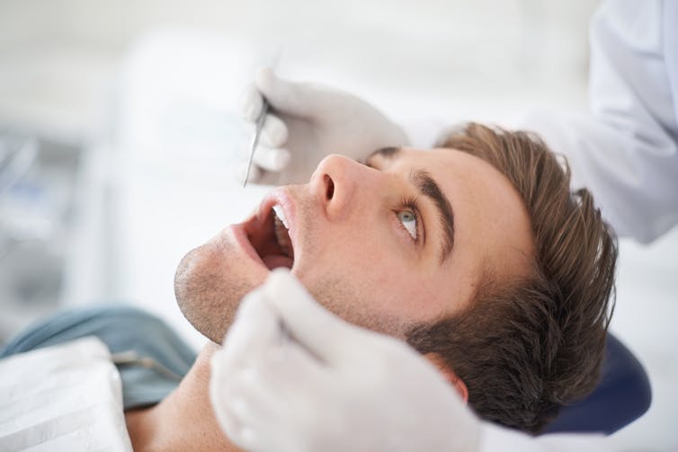 Man having dental check up