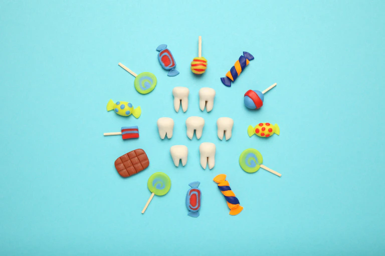 Teeth surrounded by a circle of candies