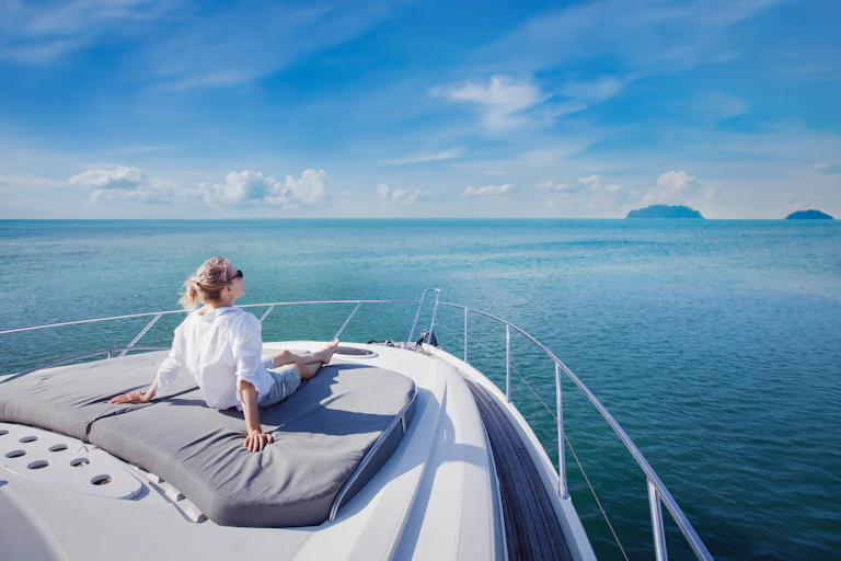Woman on a luxury yacht.