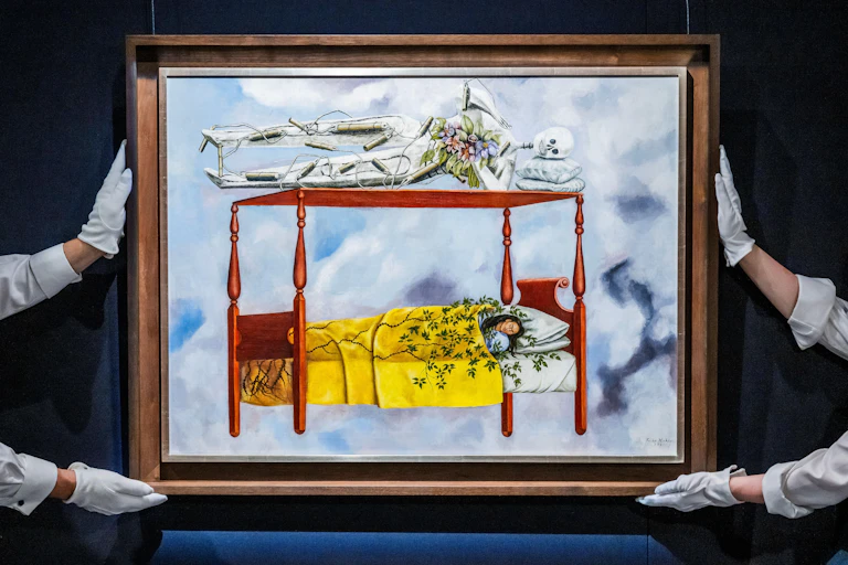 Painting of Kahlo askeep in bed with a skeleton lying on the top of the four poster.
