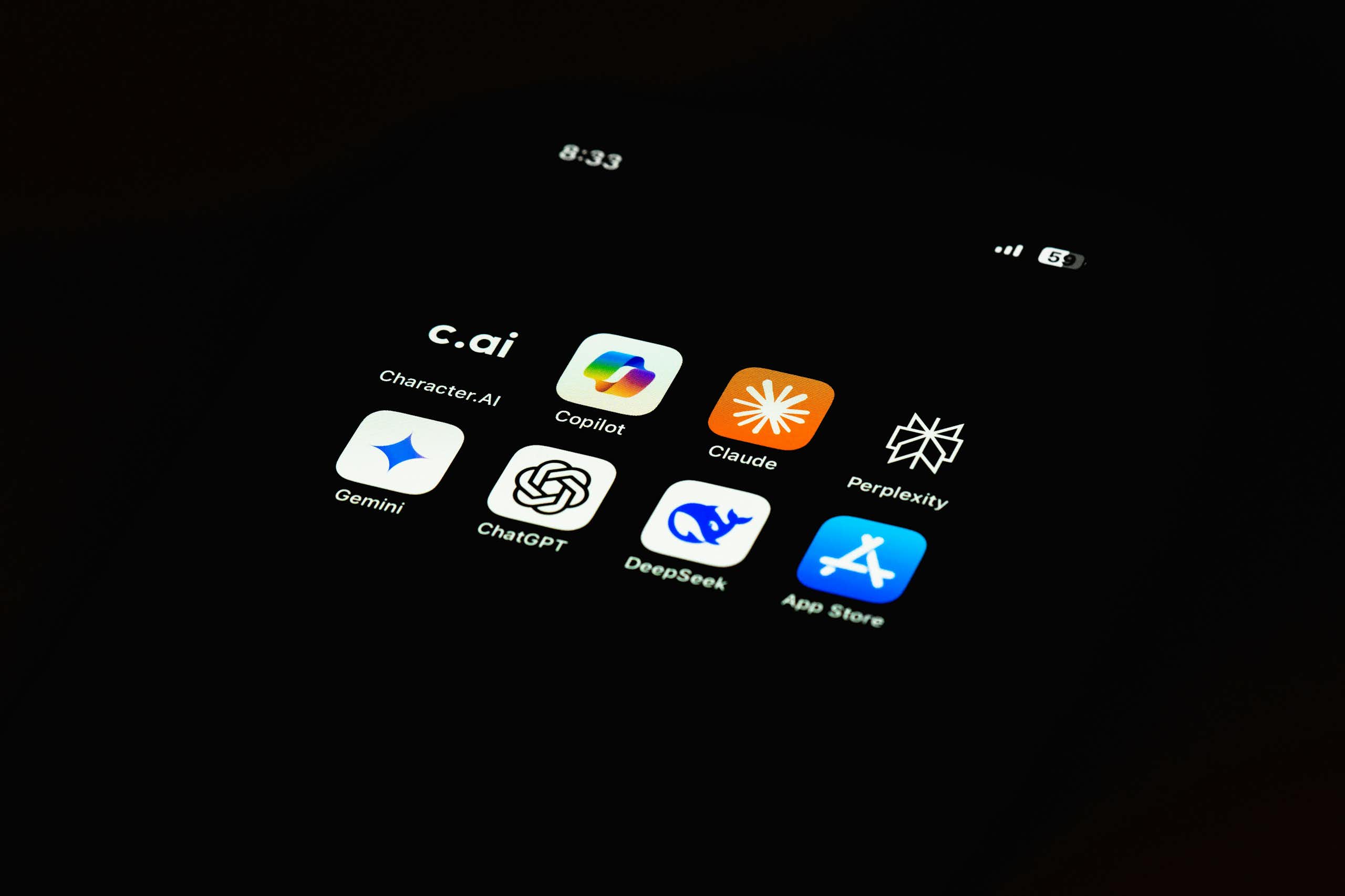 A dark phone screen displaying AI apps