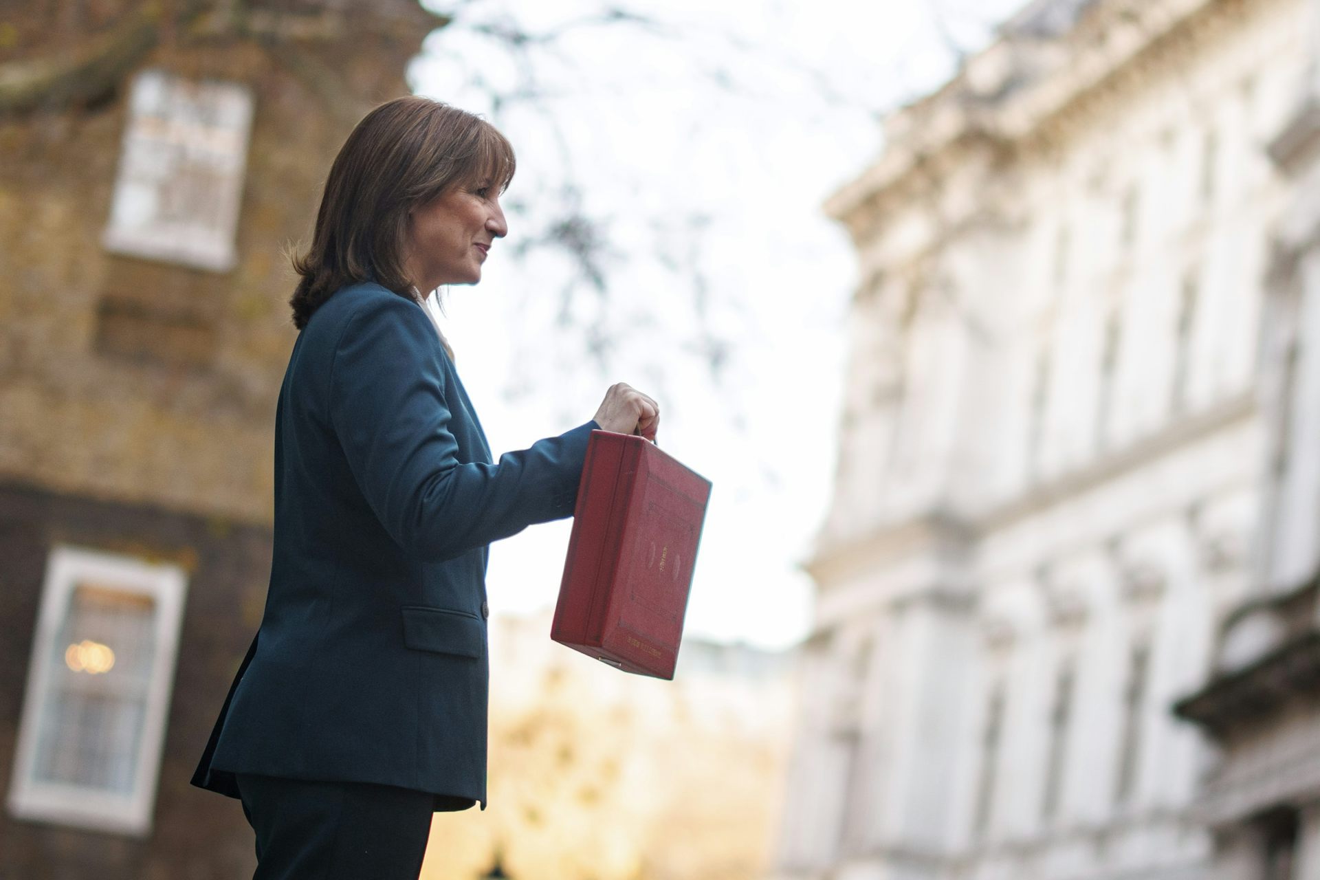 uk chancellor rachel reeves poses in downing street with the red budget briefcase