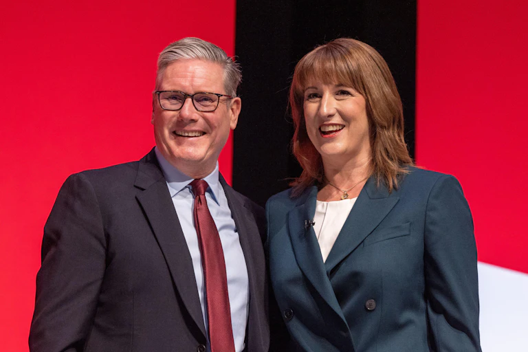 Smiling Keir Starmer and Rachel Reeves