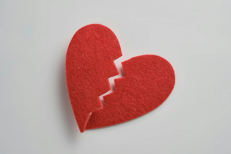 A broken felt heart.