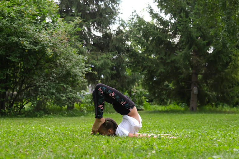 Girl does exercises to strengthen her body and spirit.