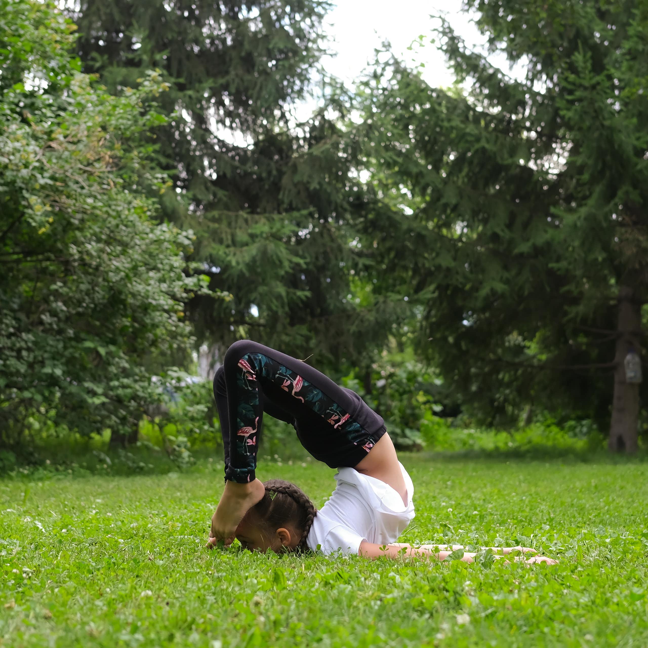 Girl does exercises to strengthen her body and spirit.