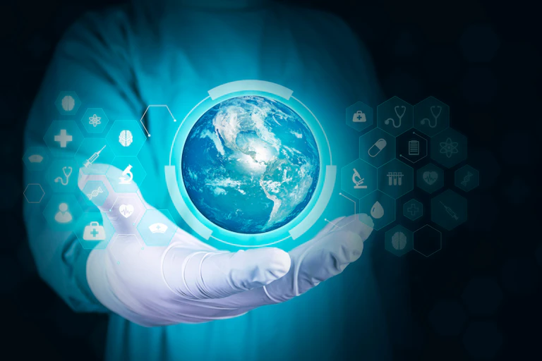 Doctor's hand holds earth globe isolated on digital dark background