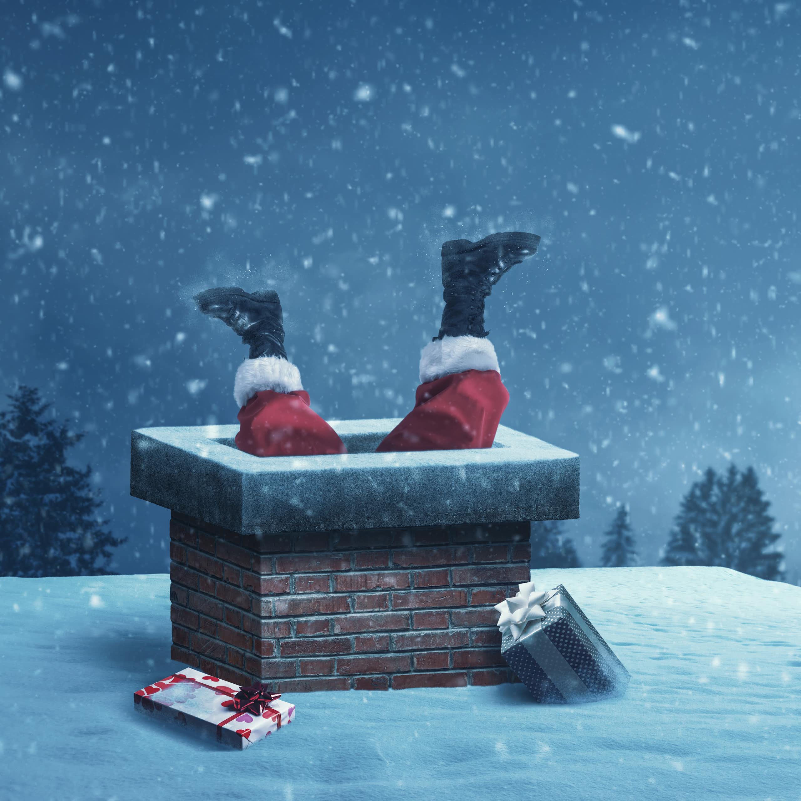 Santa's legs sticking out of a chimney
