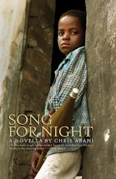 A book cover featuring a photo of a young African boy leaning against a wall and looking into camera.