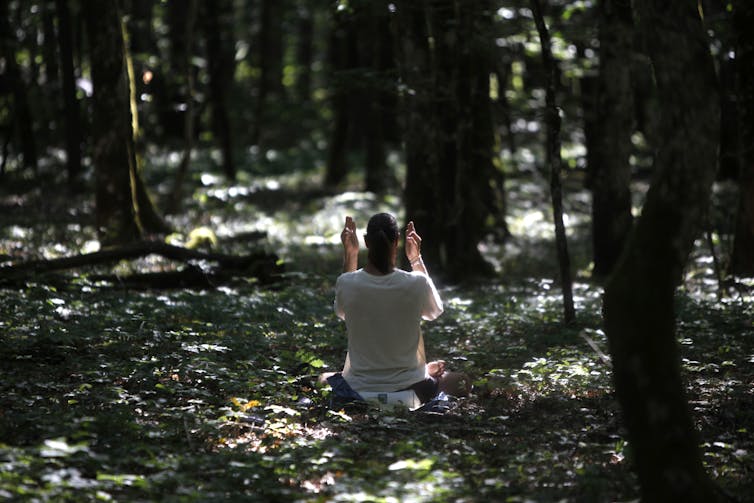 Outdoor the West, the Kundalini custom items a style of the ‘divine feminine’ past binary gender 1 A woman meditates in the forest.