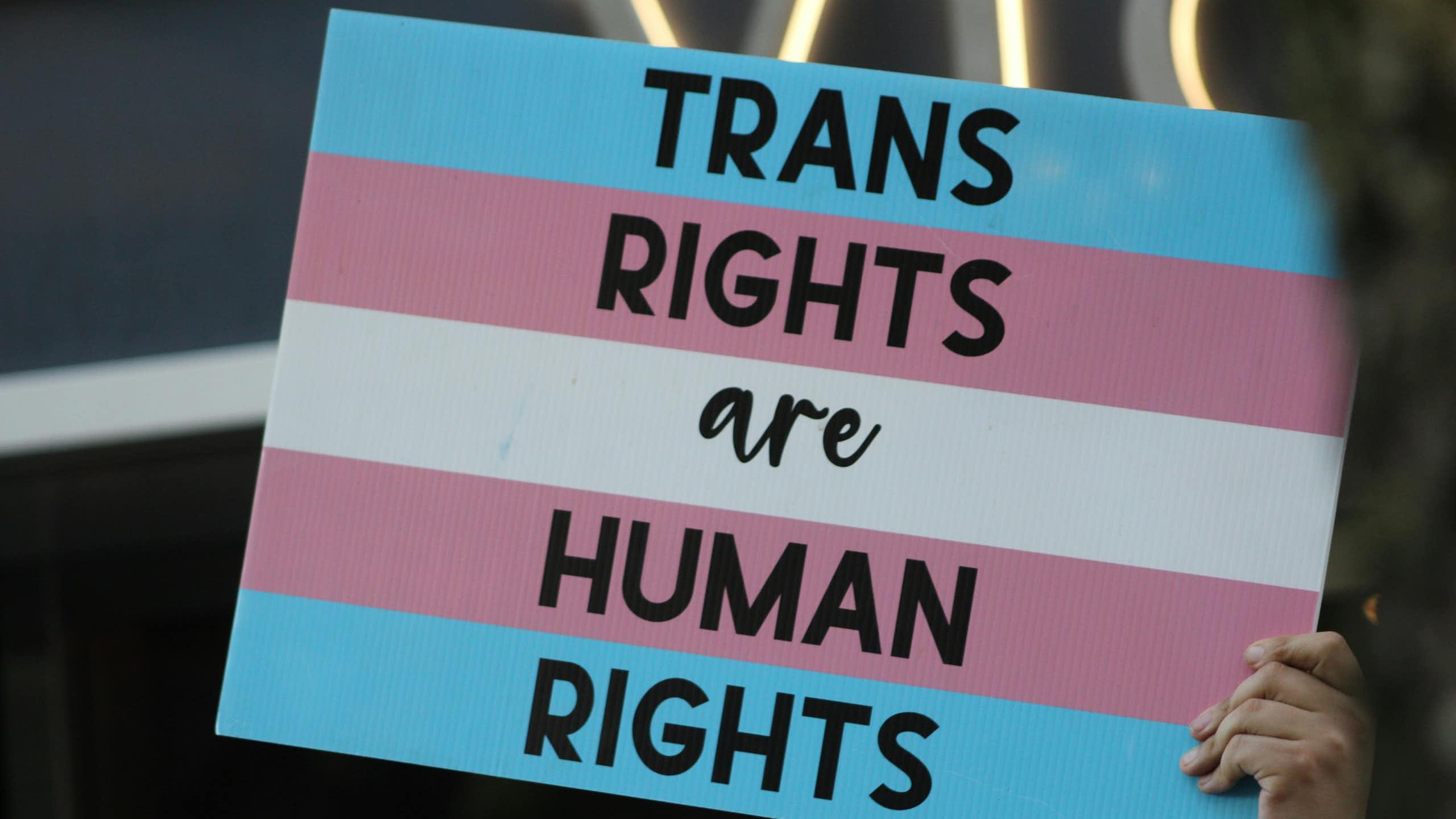 A sign defending transgender rights as human rights.